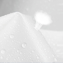 a white umbrella with a cloud on it