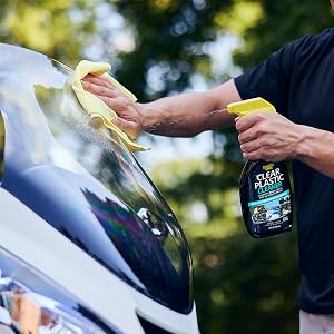 Invisible Glass Clear Plastic Cleaner being used to clean a motorcycle windshield