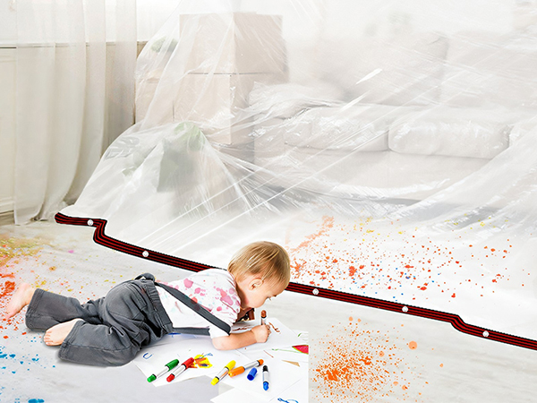 Clear plastic drop cloth or protective sheet spread on floor with colorful paint splatters beneath.