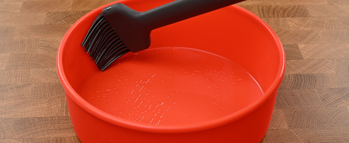 sweeping oil along the walls of the air fryer cake pan