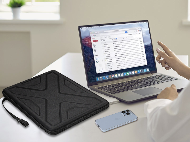 a laptop with a laptop and a mouse pad on the table