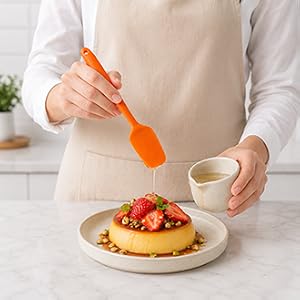 orange silicone spatula decorating dessert
