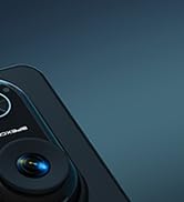 Close-up of dark blue/teal gaming controller or input device against matching blue background, showing partial view of buttons and controls.