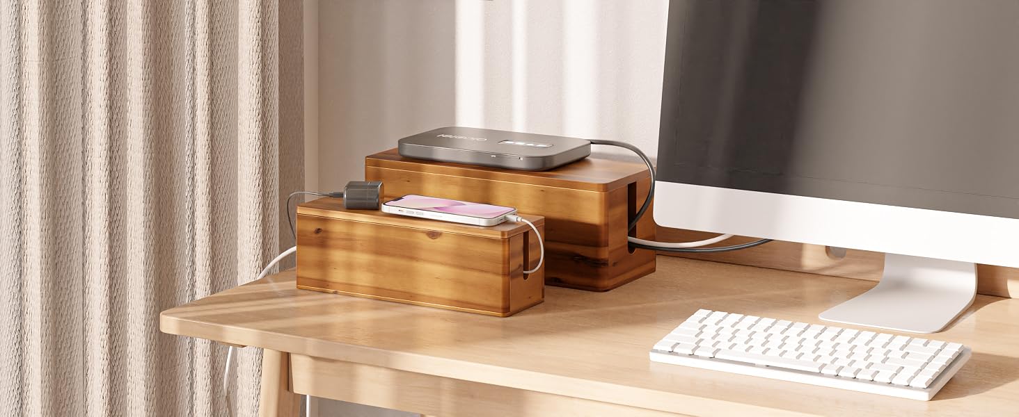 small and large cable box side by side next to computer
