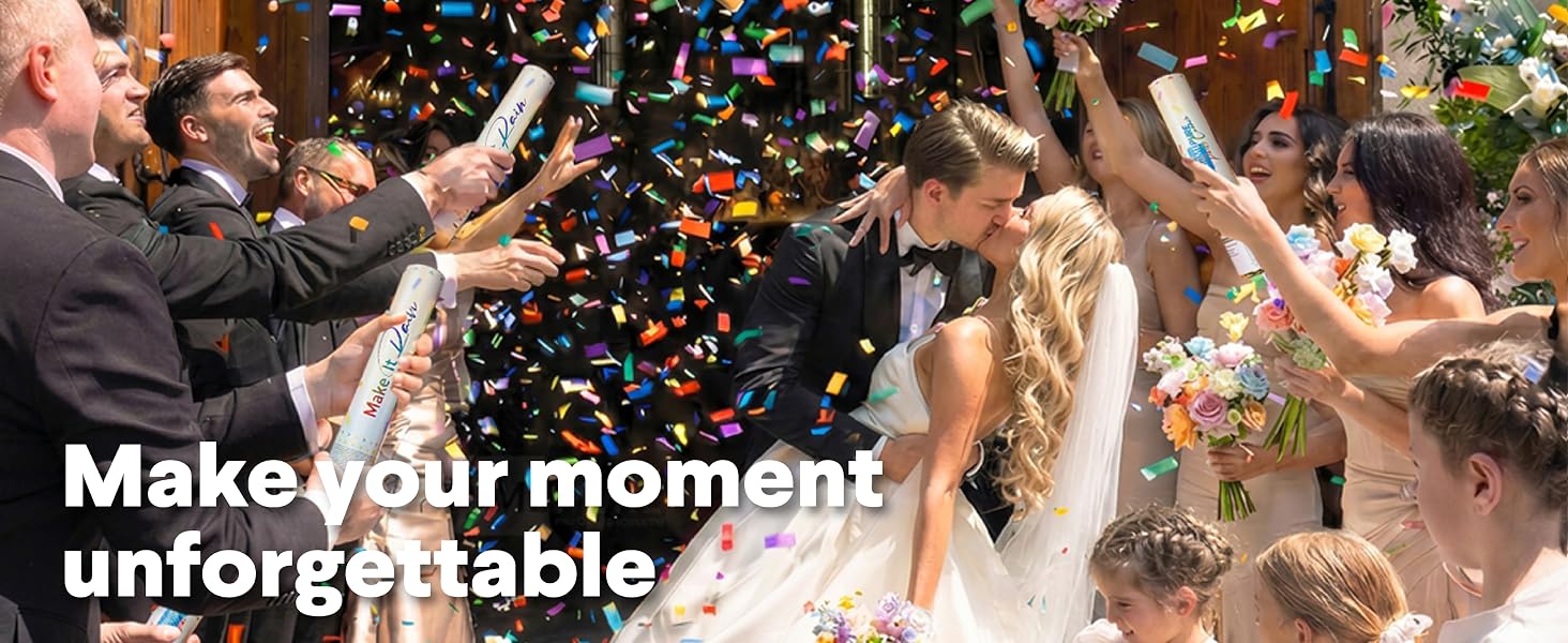 Bride and groom kissing while guests shoot confetti cannons at joyful wedding