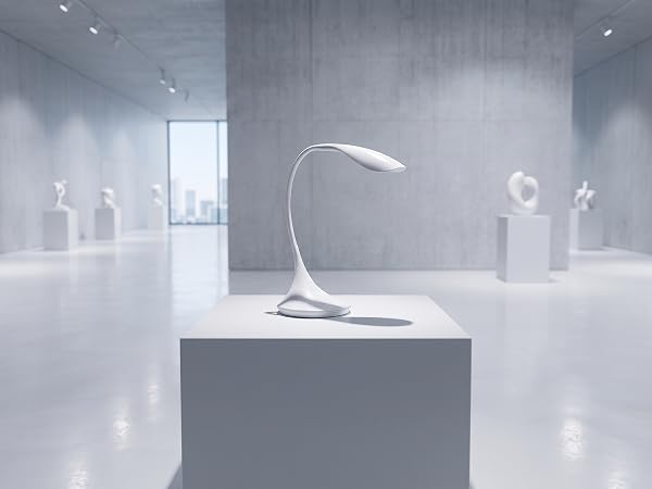 goose-neck lamp on art gallery