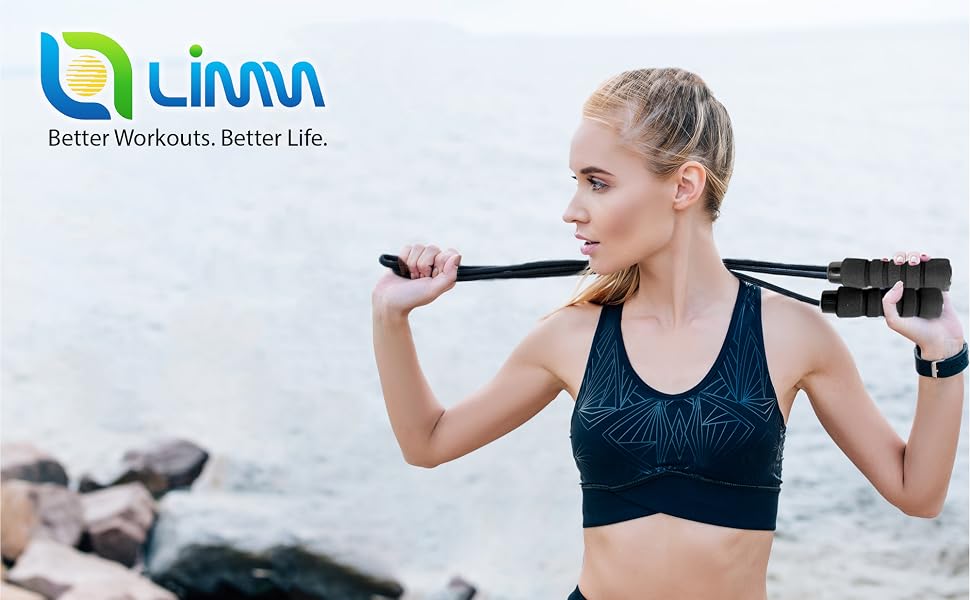 Girl looking at her side holding a limm jump rope