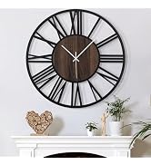 Large round wall clock with black Roman numerals, wooden center face, and industrial-style metal frame design.