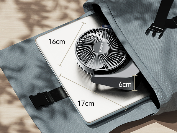 Portable fan mounted in gray fabric with dimensions marked: 16cm, 17cm, and 6cm, showing technical specifications.
