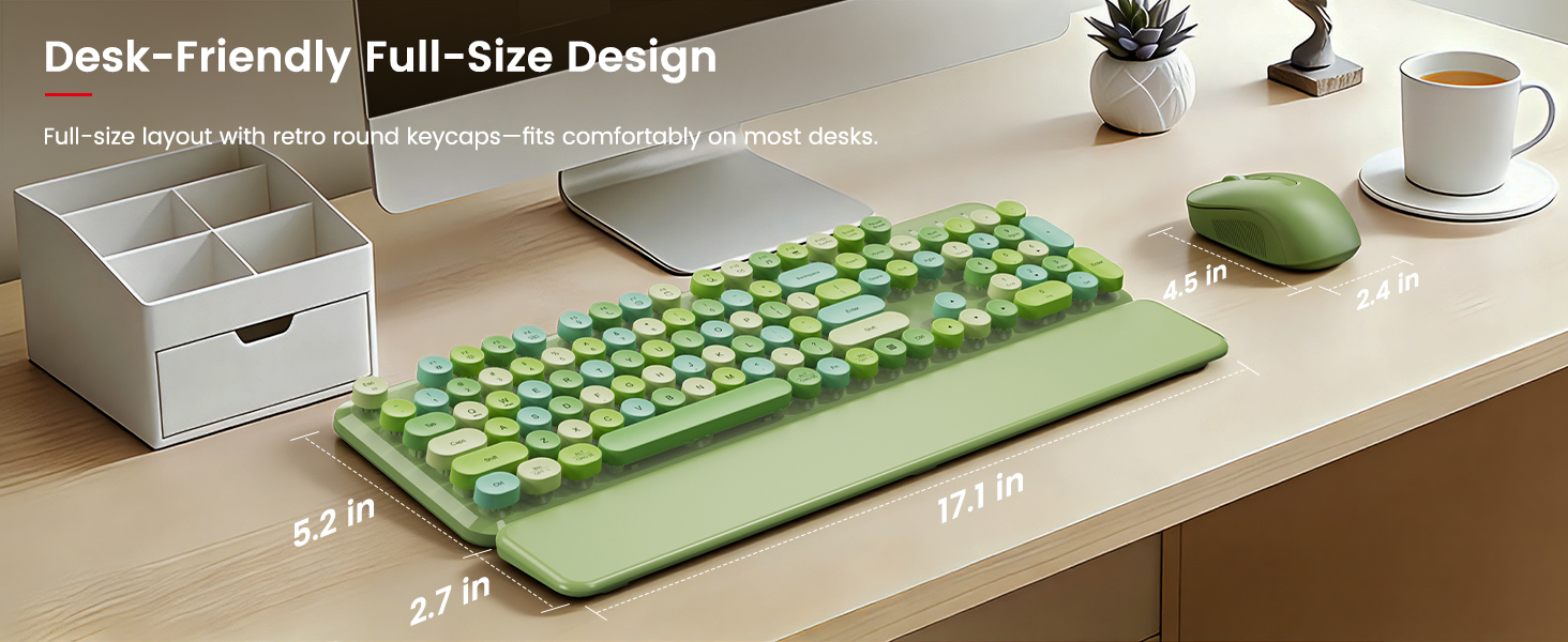 Green full-size keyboard and mouse with wrist rest shown in a desk-friendly layout
