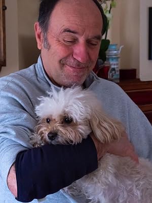 Elder holding pet with arm weight