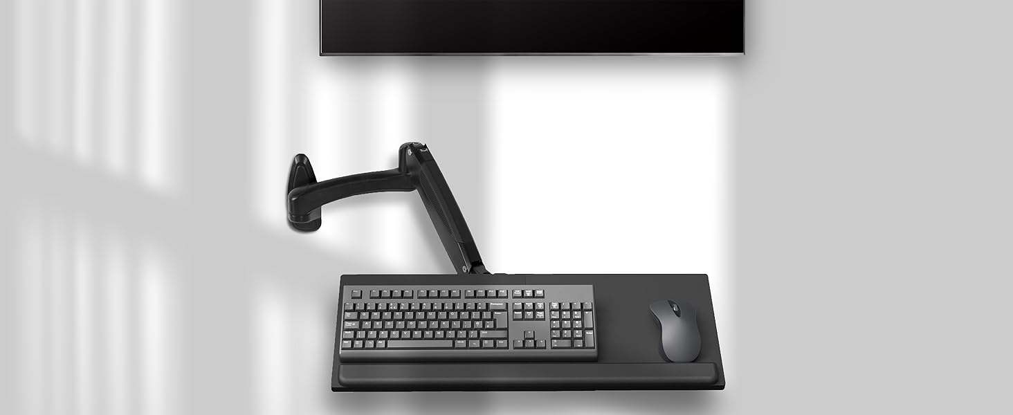 Keyboard tray mounted to wall
