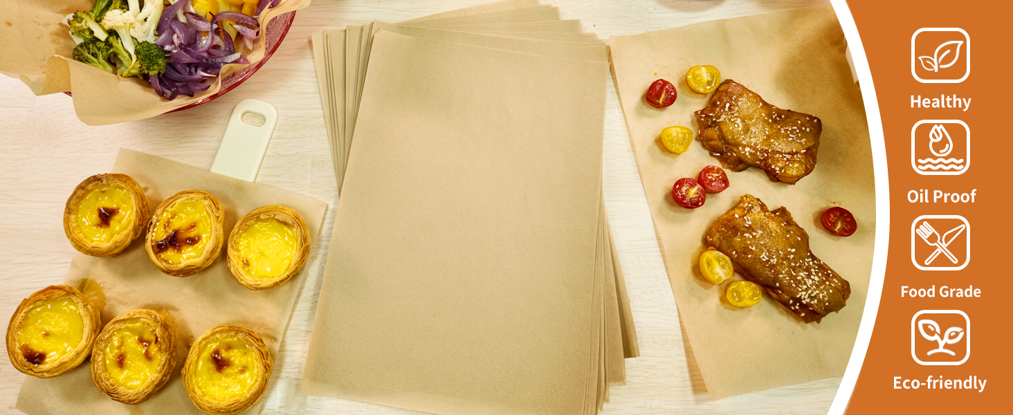 Birds-eye view of prepared food items on a light-colored surface, including what appears to be baked or grilled items with garnishes.