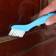 Door seam cleaning brush