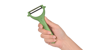a hand holding a razor blade.
