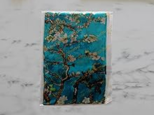 Decorative blue and gold artwork or panel shown against marble background, displayed from multiple angles showing textural details.