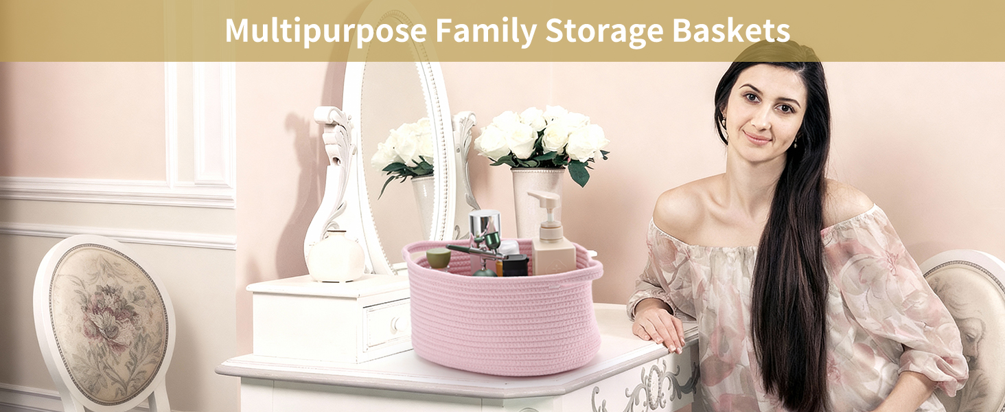 Pink cotton rope storage basket holding skincare products on a vanity table with a woman