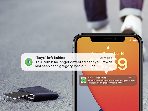 Smartphone displaying message notification screen on dark surface, showing iOS interface elements and text messages.