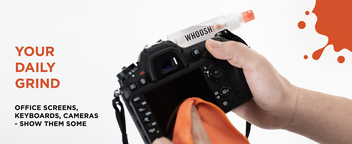 WHOOSH! screen cleaner bottle and microfiber cloth next to a MacBook Pro laptop.
