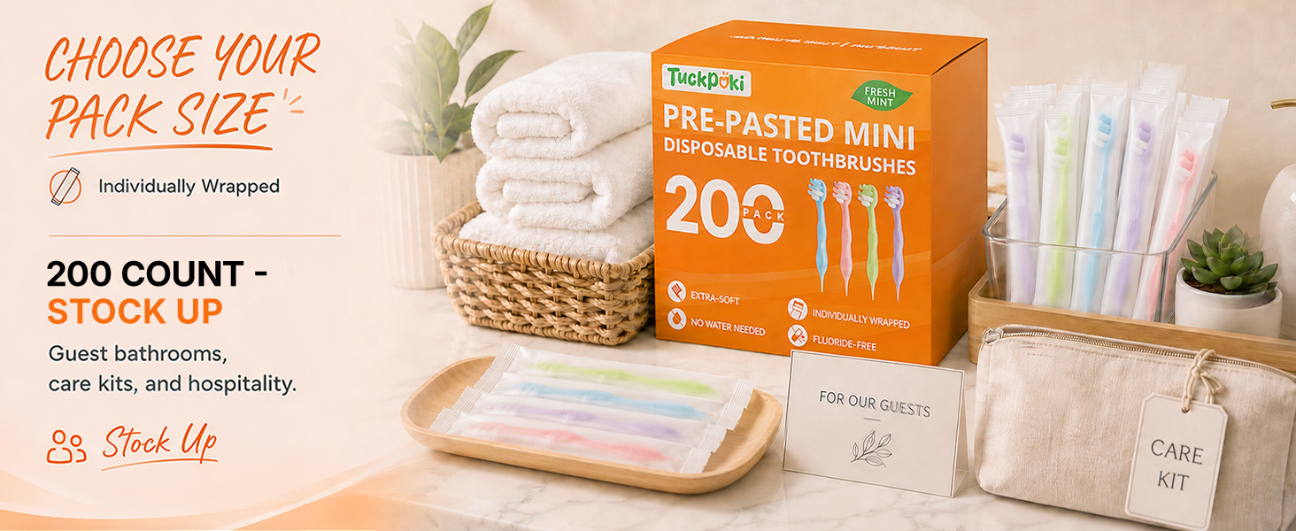 TuckPoki 200-count prepasted toothbrushes arranged for guest bathrooms and care kits.
