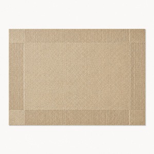 Full rectangular light neutral woven placemat showing the directional border