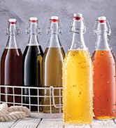 Giara Swing Top Bottles 33 ¾ Ounce/1 Liter ROUND Clear Glass Grolsch Flip Top Bottle With Stopper...