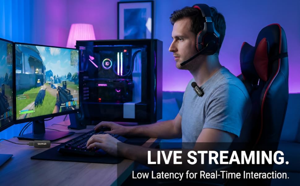 Gamer wearing headset and SAKHAR wireless microphone while live streaming at a computer desk.