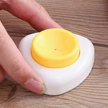 step 2 Place egg slicer on any flat surface