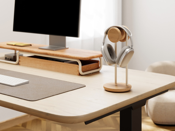 Text reads 'Image 3'. Modern minimalist desk setup with wooden surface, showing desk accessories and computing equipment in a clean, organized workspace.