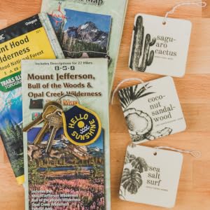 3 botanical car fresheners and maps