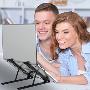 Adjustable laptop stand with multiple angle positions, demonstrated by two people using it with a laptop.