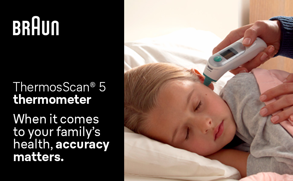 Parent testing girl child's fever temperature using Braun Ear thermometer