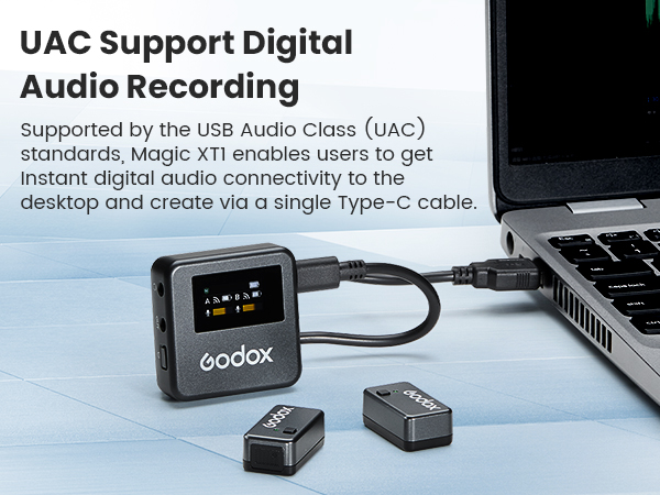 Godox digital audio recording device with USB Type-C connection, shown with laptop and additional components on blue surface.