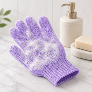 Lavender exfoliating glove with rich lather beside soap and body wash