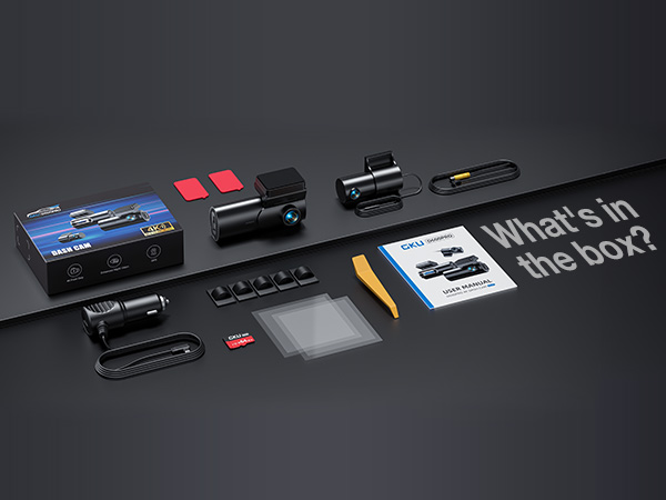 Product unboxing layout showing electronic devices, accessories, and documentation spread out against dark background with 'What's in the box?' text.