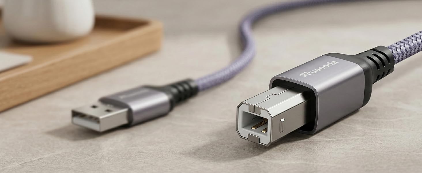 Close up of USB Type A and USB Type B gold-plated connectors with aluminum shell and braided jacket