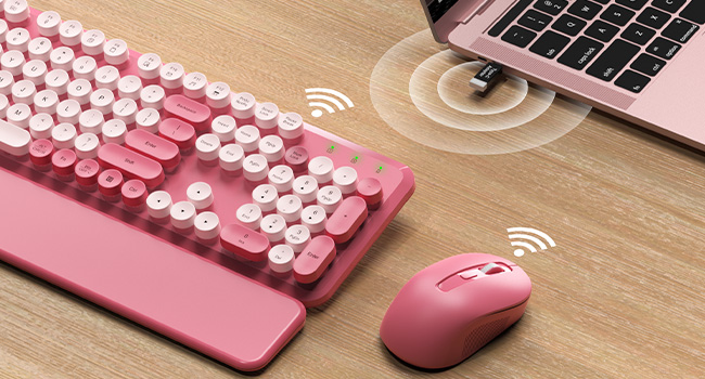 Pink wireless retro keyboard and mouse with USB receiver and 2.4GHz connection.