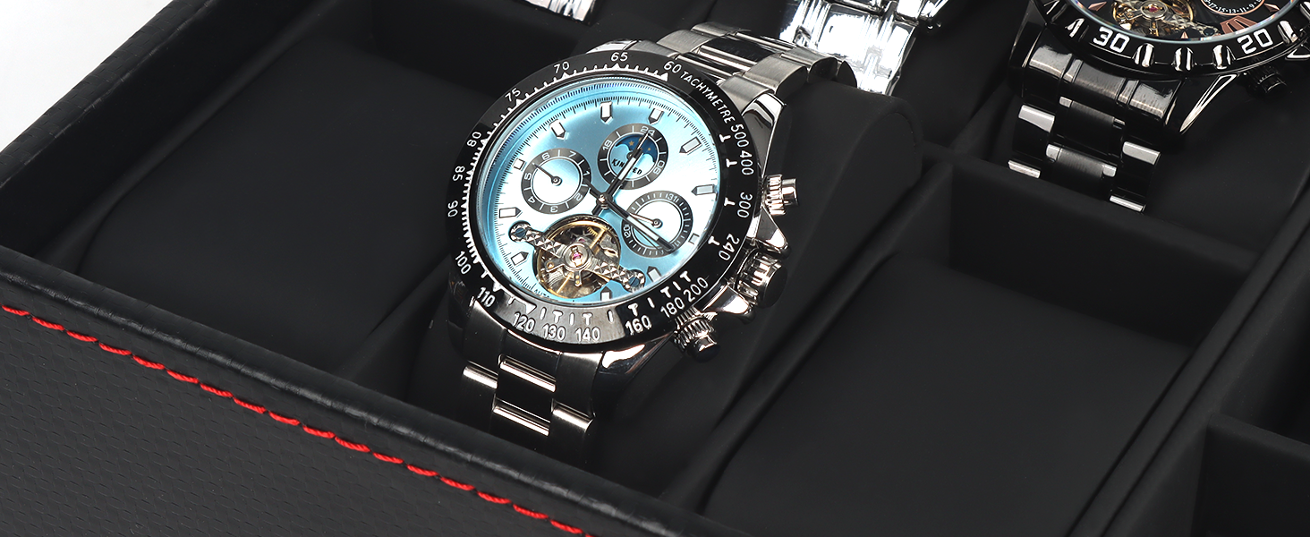 Luxury chronograph watch with stainless steel bracelet displayed in black presentation box. Features light-colored dial and rotating bezel.