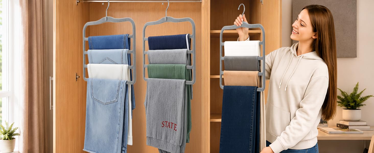 Space saving pants hangers used in small dorm room closet organizer