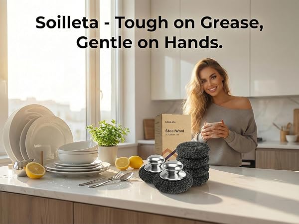 Stainless steel scrubber with metal handle on cast iron skillet for heavy duty cleaning.