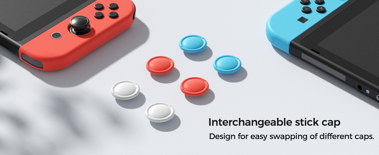 Text reads 'Interchangeable stick cap'. Nintendo Switch controllers with red and blue Joy-Cons shown alongside various white, red and blue stick caps for customization.