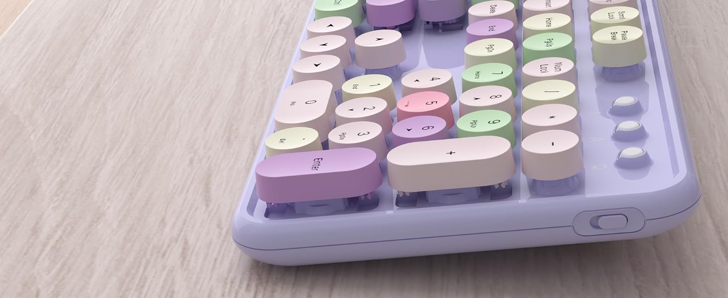purple colorful wireless keyboard and mouse