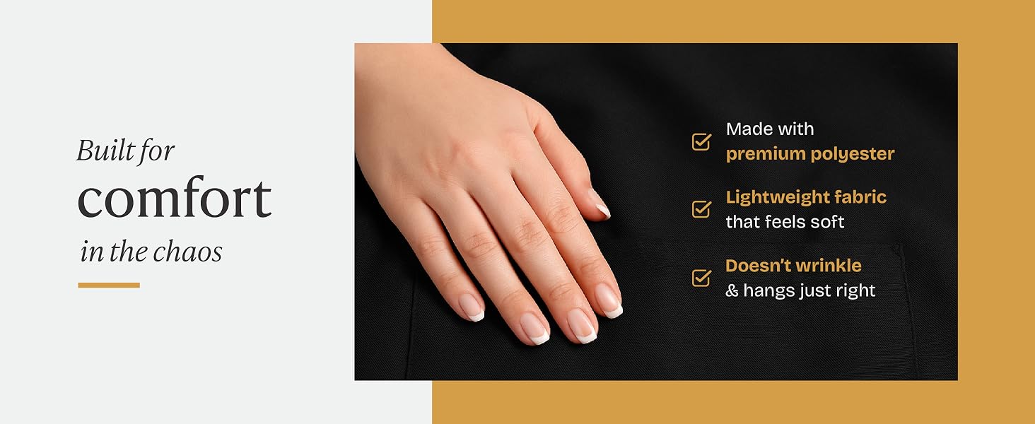 Hand on apron fabric to highlught the high quality fabric.