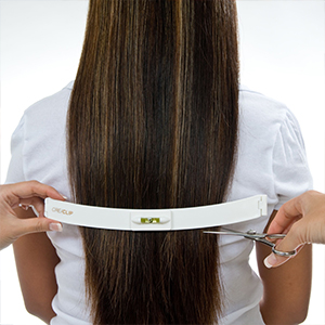Women getting layered hair cut with CreaClip hair cutting tool