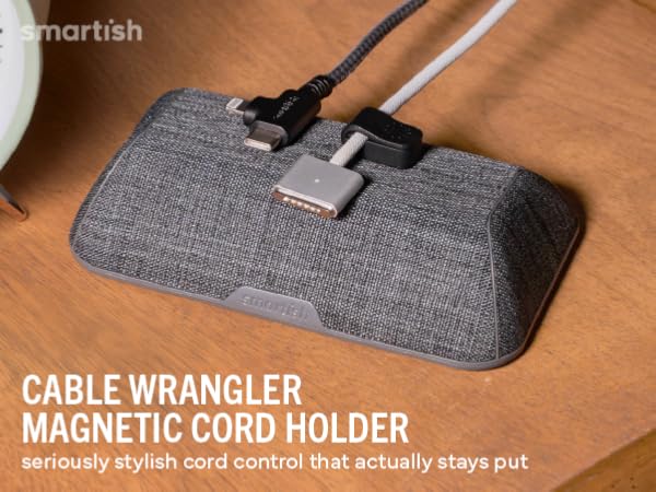 Cable Wrangler magnetic cord holder on wood desk holding USB-C and Lightning cables within reach