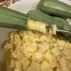 Customer photo of a zucchini with a hole in it