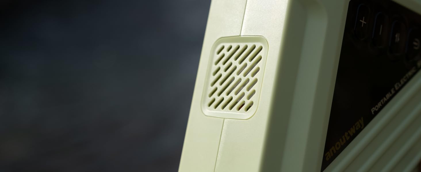 Close-up of a rectangular vented panel, likely a speaker grille or air vent, integrated into a light-colored surface or device frame.