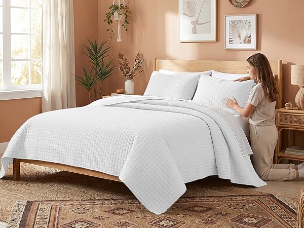 Oversized king bedspread in white with breathable microfiber and elegant drape