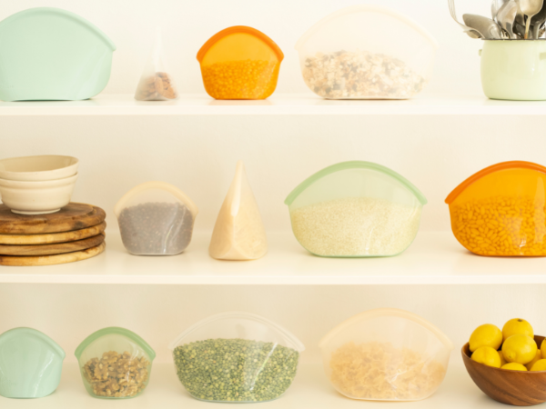 Reusable silicone food bags storing food in an organized pantry