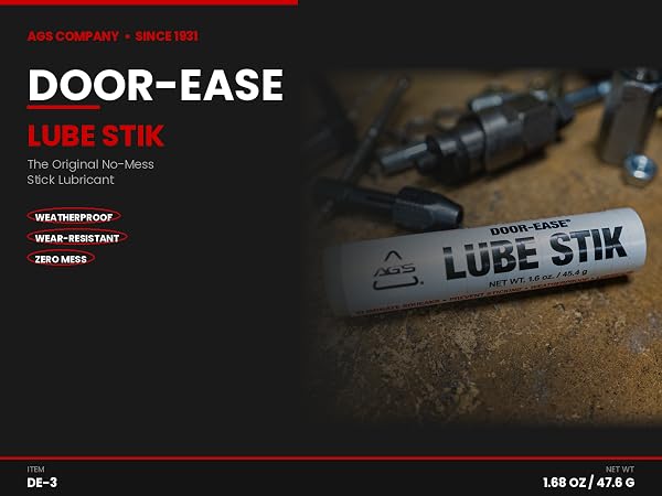 Door-Ease Lube Stik 1.68 oz lubricant on workshop bench with tools